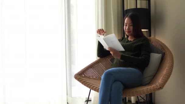 Footage Beautiful Asian Woman Reading Book Home — Stock Video