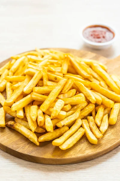 French fries with tomato or ketchup sauce — Stock Photo, Image