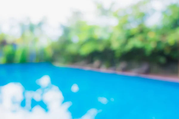 Abstract blur outdoor swimming pool in hotel resort — Stock Photo, Image