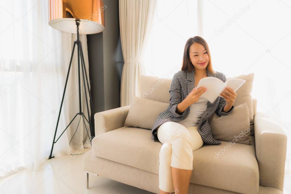 Portrait beautiful young asian women reading book and sitting on
