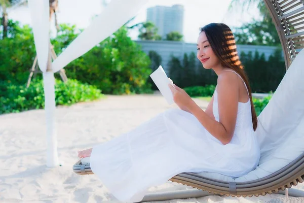 Portrait beautiful asian woman reading book around beach sea oce — Stock Photo, Image