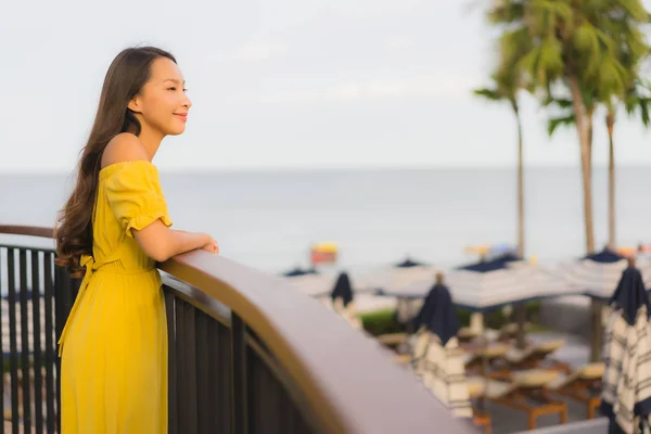 Portrait beautiful asian women happy smile relax on the tropical