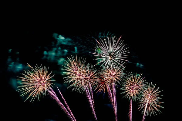 Beautiful colorful firework display at night for celebrate