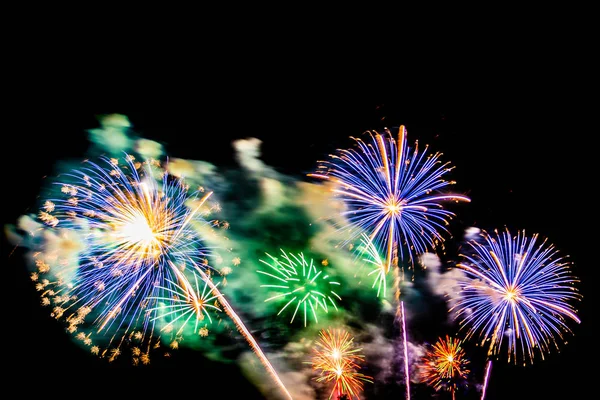 Beautiful colorful firework display at night for celebrate — Stock Photo, Image