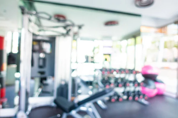 Abstract blur gym room interior with fitness equipment — Stock Photo, Image