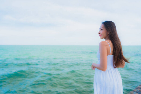 Portrait beautiful asian women around beach sea ocean with happy