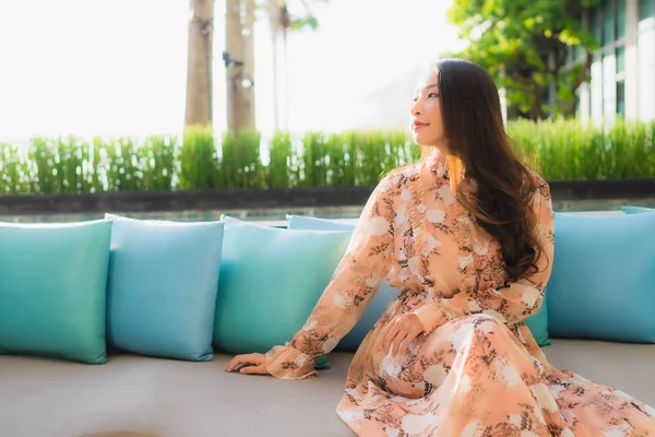 Portrait beautiful young asian women happy smile sit on sofa aro — Stock Photo, Image