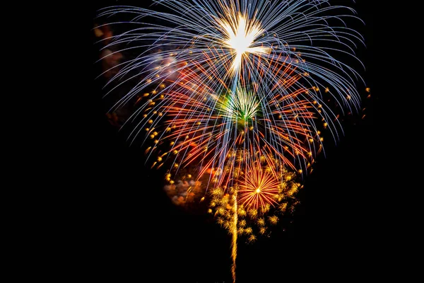 Beautiful colorful firework display at night for celebrate Stock Photo