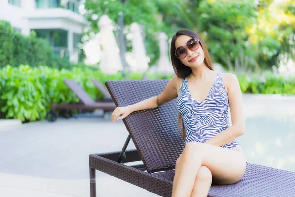 Beautiful young asian women happy smile relax around outdoor swi — 스톡 사진