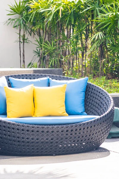 Outdoor patio in the garden with sofa chair and pillow decoratio — ストック写真