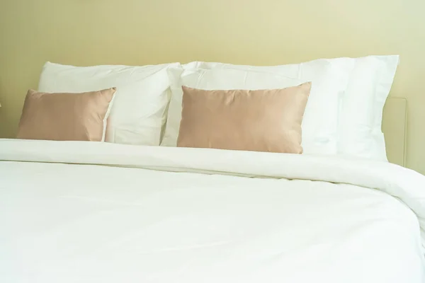 White comfortable pillow on bed decoration interior Royalty Free Stock Photos