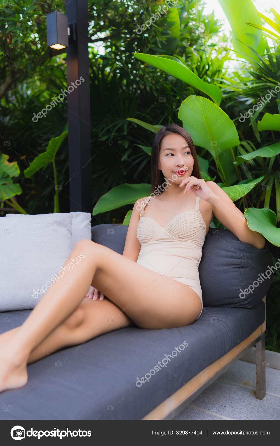 Portrait beautiful young asian women happy smile relax outdoor s Stock Photo by ©mrsiraphol 329877404