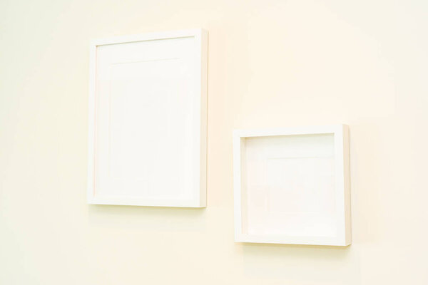 Empty photo frame on wall decoration interior