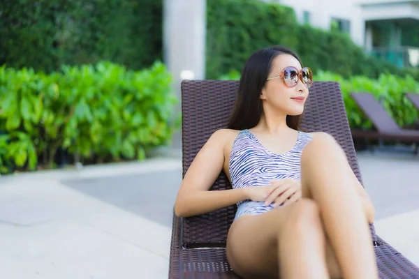 Beautiful young asian women happy smile relax around outdoor swi — 스톡 사진