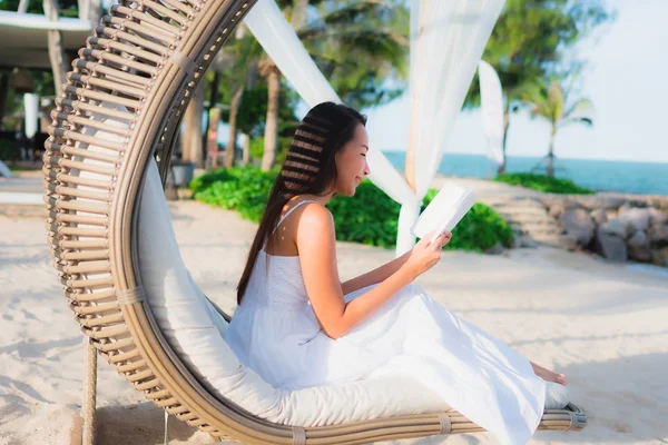 Portrait beautiful asian woman reading book around beach sea oce — Stock Photo, Image