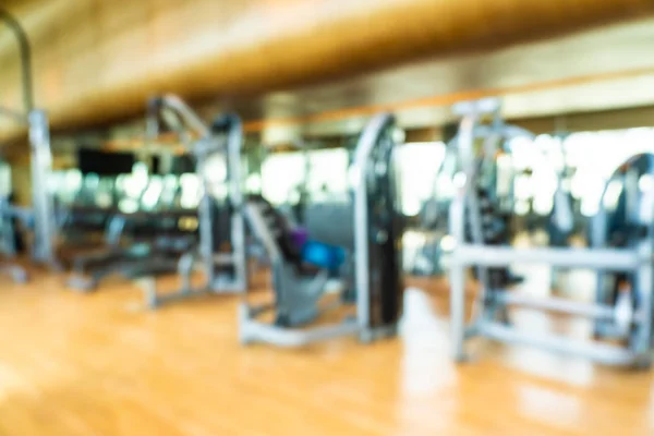 Abstract blur fitness equipment in gym interior room — Stock Photo, Image