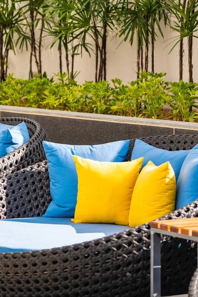 Outdoor patio in the garden with sofa chair and pillow decoratio — ストック写真