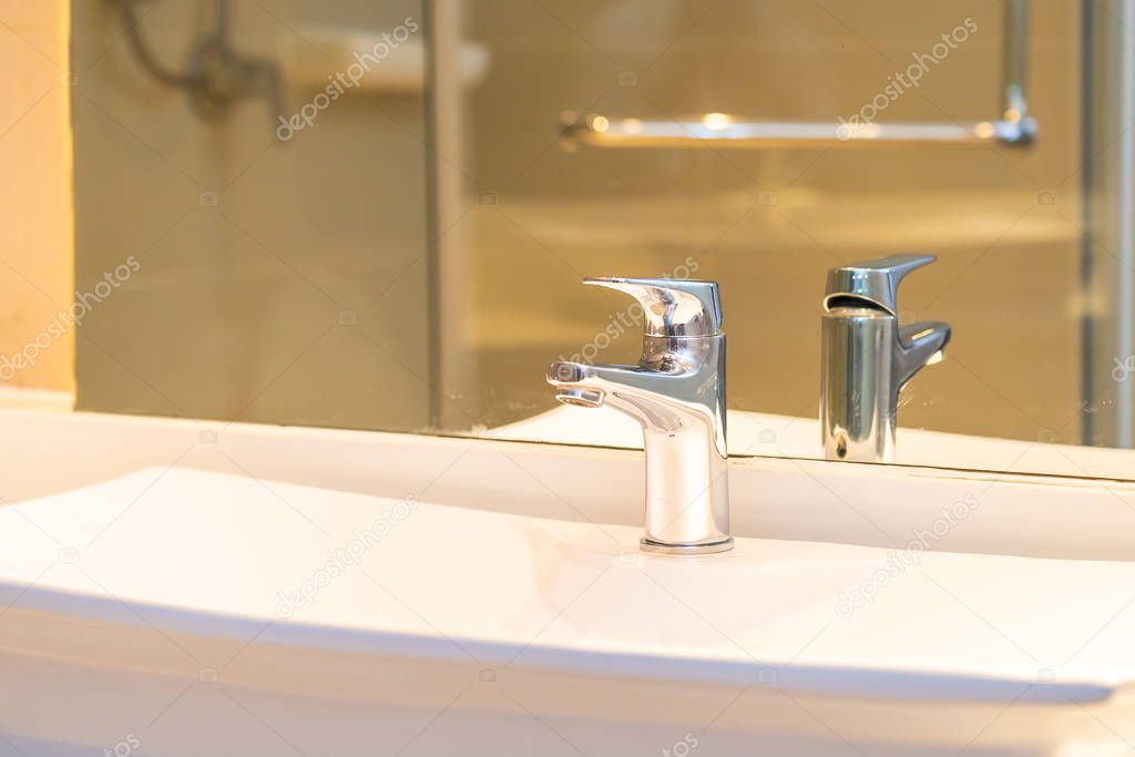 Water facuet and white sink decoration interior