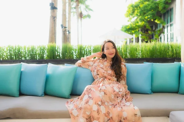 Portrait beautiful young asian women happy smile sit on sofa aro — Stock Photo, Image