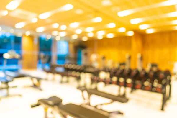 Abstrato borrão ginásio quarto interior com equipamento de fitness — Fotografia de Stock