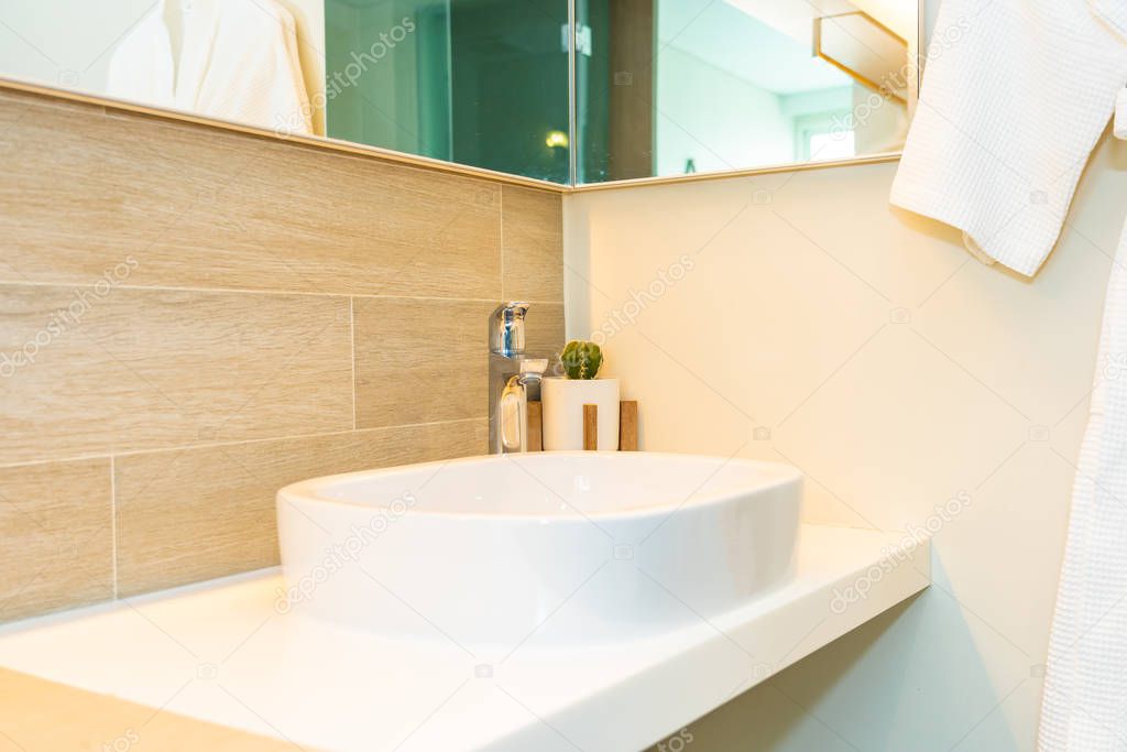 Water facuet and white sink decoration interior