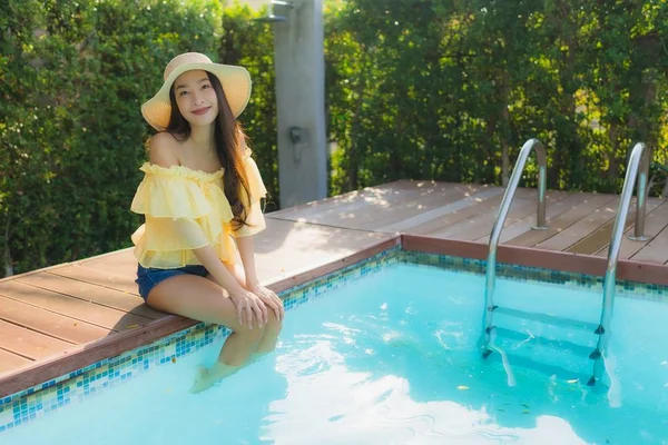 Portrait young asian woman happy smile relax around outdoor swim — Stock Photo, Image