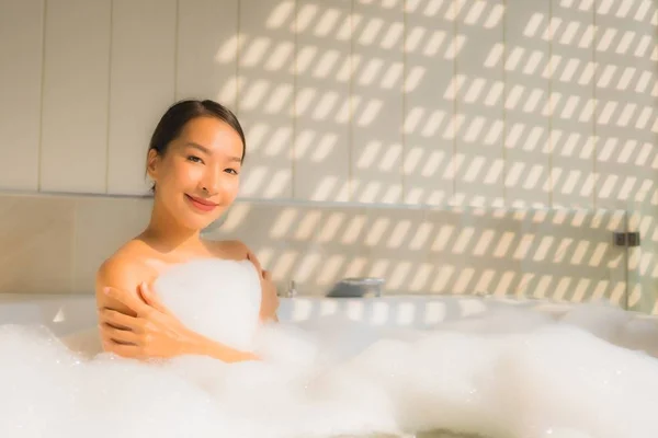 Portrait young asian woman relax take a bath in bathtub — Stock Photo, Image