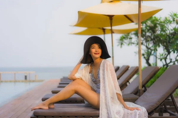 Portrait young asian woman happy smile relax around outdoor swim — Stock Photo, Image