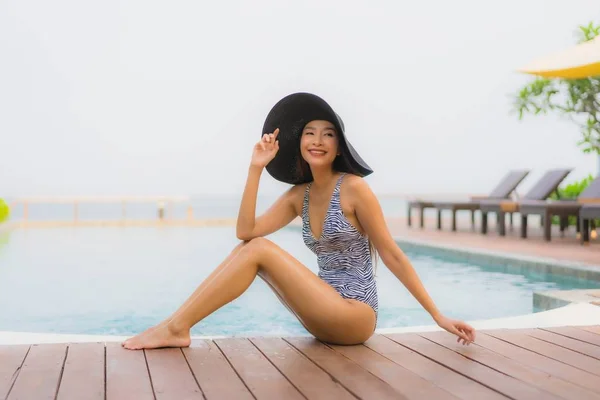 Portrait young asian woman happy smile relax around outdoor swim — 스톡 사진