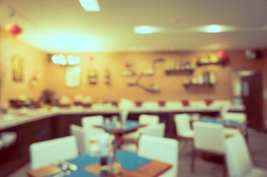 Arka plan için soyut bulanık restoran ve kafenin içi