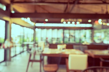 Arka plan için soyut bulanık restoran ve kafenin içi