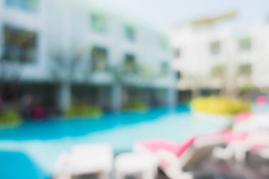 Soyut bulanıklık ve arka plan için otel tatil beldesinde açık yüzme havuzu.