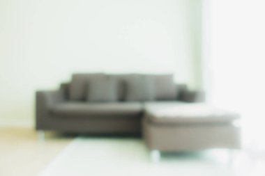 Arka plan için oturma odasının iç tarafındaki bulanık ve bulanık kanepe dekorasyonu