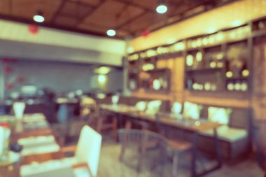 Arka plan için soyut bulanık restoran ve kafenin içi