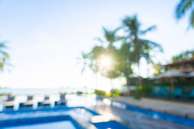 Seyahat ve tatil geçmişi için otel tatil beldesinde soyut bulanıklık ve açık yüzme havuzu