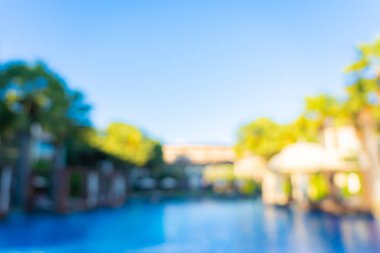 Seyahat ve tatil geçmişi için otel tatil beldesinde soyut bulanıklık ve açık yüzme havuzu