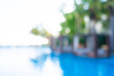 Seyahat ve tatil geçmişi için otel tatil beldesinde soyut bulanıklık ve açık yüzme havuzu