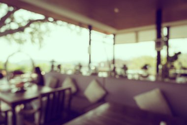 Arka plan için soyut bulanıklık ve kahve dükkanı ve restoran iç mekanı.