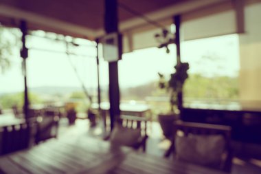 Arka plan için soyut bulanıklık ve kahve dükkanı ve restoran iç mekanı.