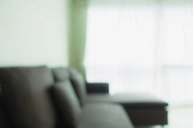 Arka plan için oturma odasının iç tarafındaki bulanık ve bulanık kanepe dekorasyonu
