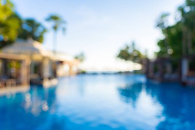 Seyahat ve tatil geçmişi için otel tatil beldesinde soyut bulanıklık ve açık yüzme havuzu