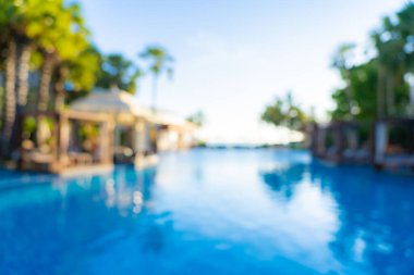 Seyahat ve tatil geçmişi için otel tatil beldesinde soyut bulanıklık ve açık yüzme havuzu