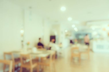 Arka plan için soyut bulanıklık ve kahve dükkanı ve restoran iç mekanı.