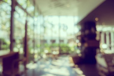 Arka plan için soyut bulanıklık ve kahve dükkanı ve restoran iç mekanı.