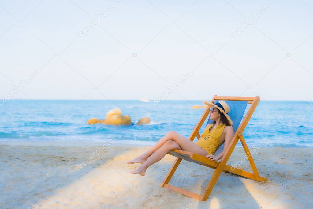 Portrait beautiful young asian women happy relax smile around sea beach ocean for travel vacation in holiday
