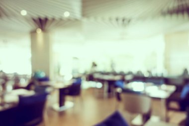 Arka plan için soyut bulanık kahve dükkanı ve restoran iç mekanı