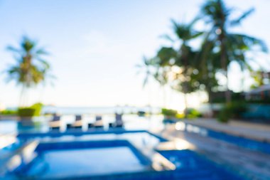 Seyahat ve tatil geçmişi için otel tatil beldesinde soyut bulanıklık ve açık yüzme havuzu