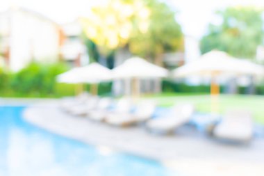 Seyahat ve tatil geçmişi için otel tatil beldesinde soyut bulanıklık ve açık yüzme havuzu
