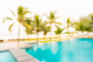 Seyahat ve tatil geçmişi için otel tatil beldesinde soyut bulanıklık ve açık yüzme havuzu