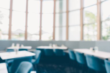 Arka plan için soyut bulanık kahve dükkanı ve restoran iç mekanı